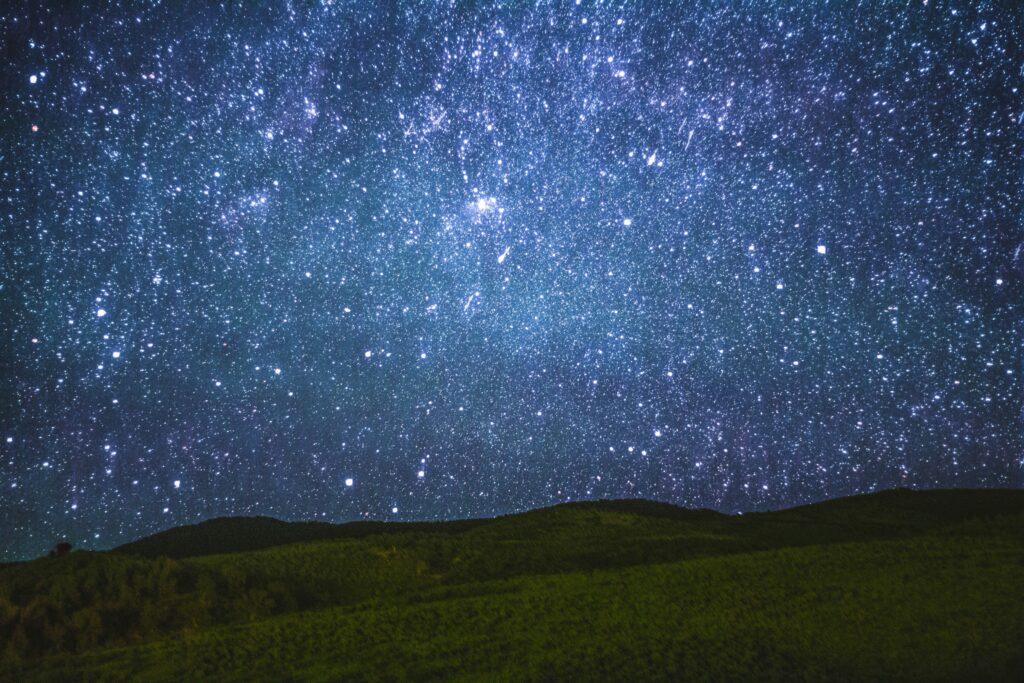 mountains under a starry sky